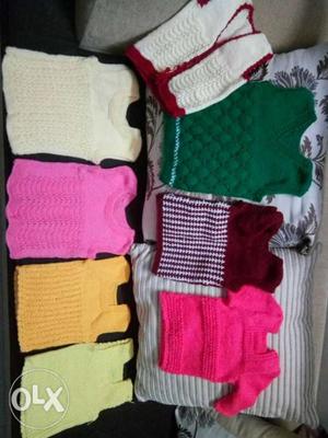 Hand made sweaters for your cuties. Rs 130/- each