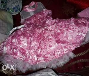 Pink flowers frock for 2 years.