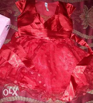 Red frock with shrug for 1 year girl.