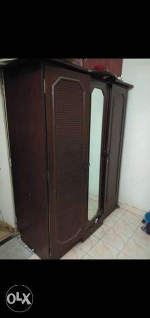 Wooden 3 door cupboard..