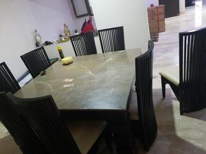 8 seater dinning table with italion stone top