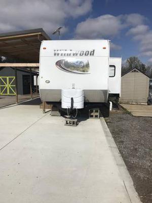 Camper with lot, large shed & awning