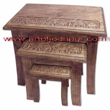 Carved wooden nesting tables