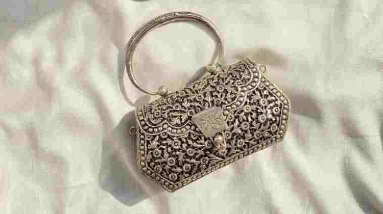 Shop pure silver clutch purse online at Chokha Haar