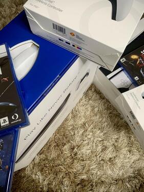 PlayStation 5 with 15 Cd game And 2 controllers coming with