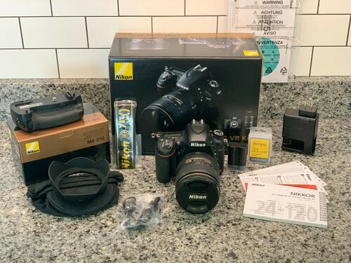 Nikon D750 with lens and accessories sealed inbox